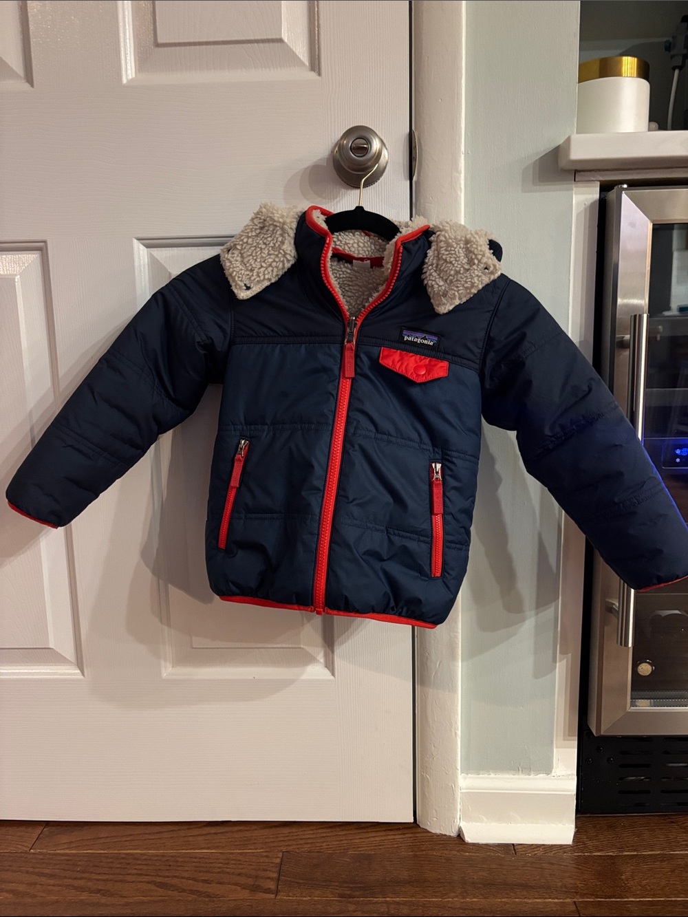 Patagonia Navy Jacket with Red Trim and Sherpa Hood